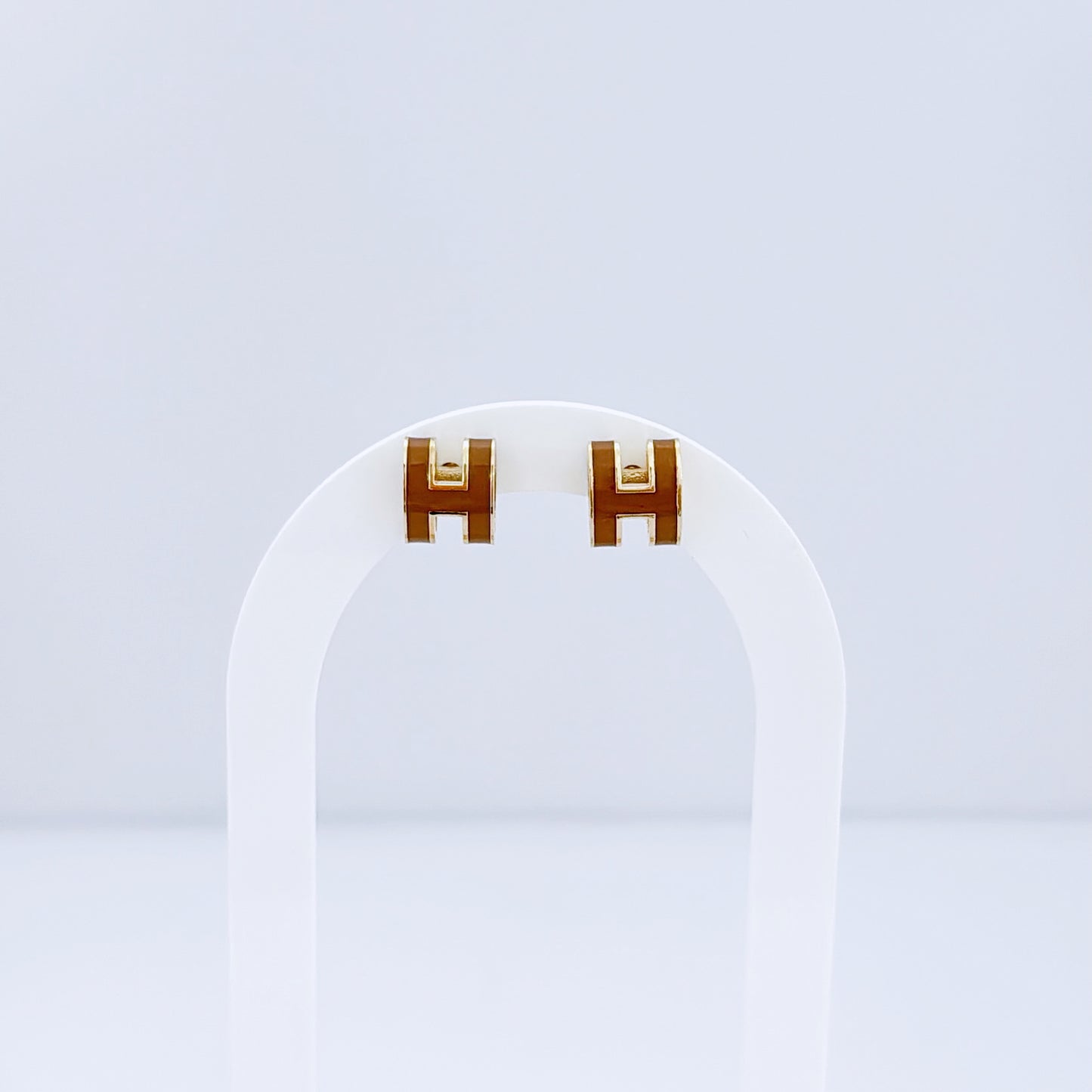 H Brown earring