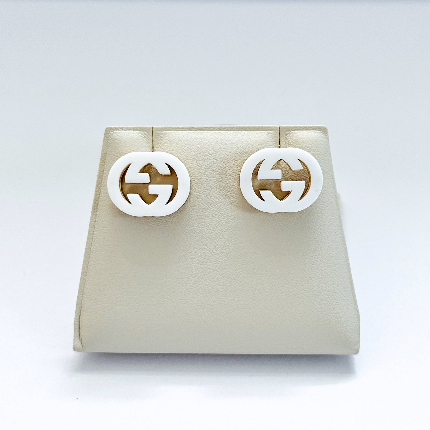 G white earring