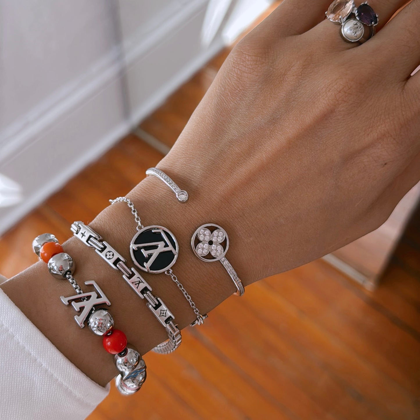 L silver bracelet