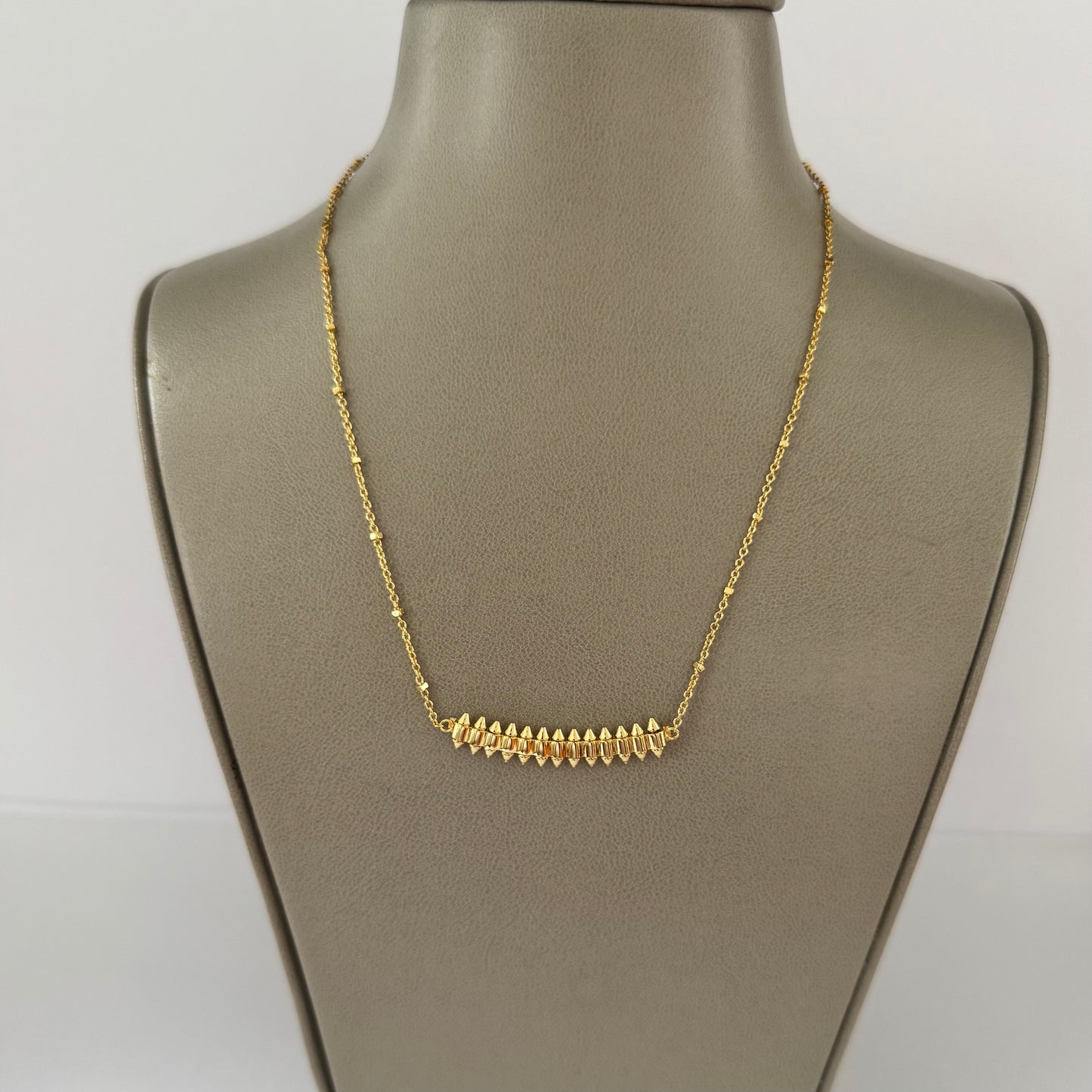 C gold necklace