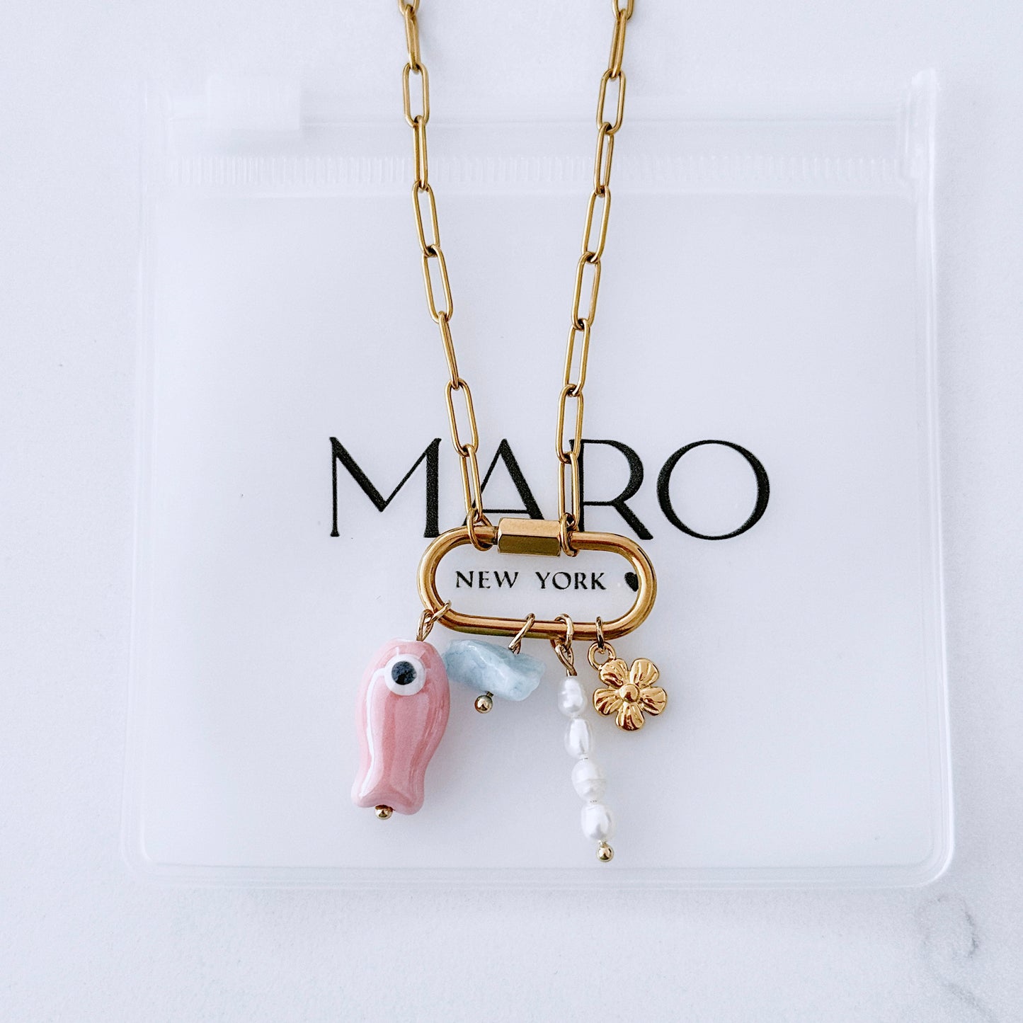 Gold charm carabiner necklace