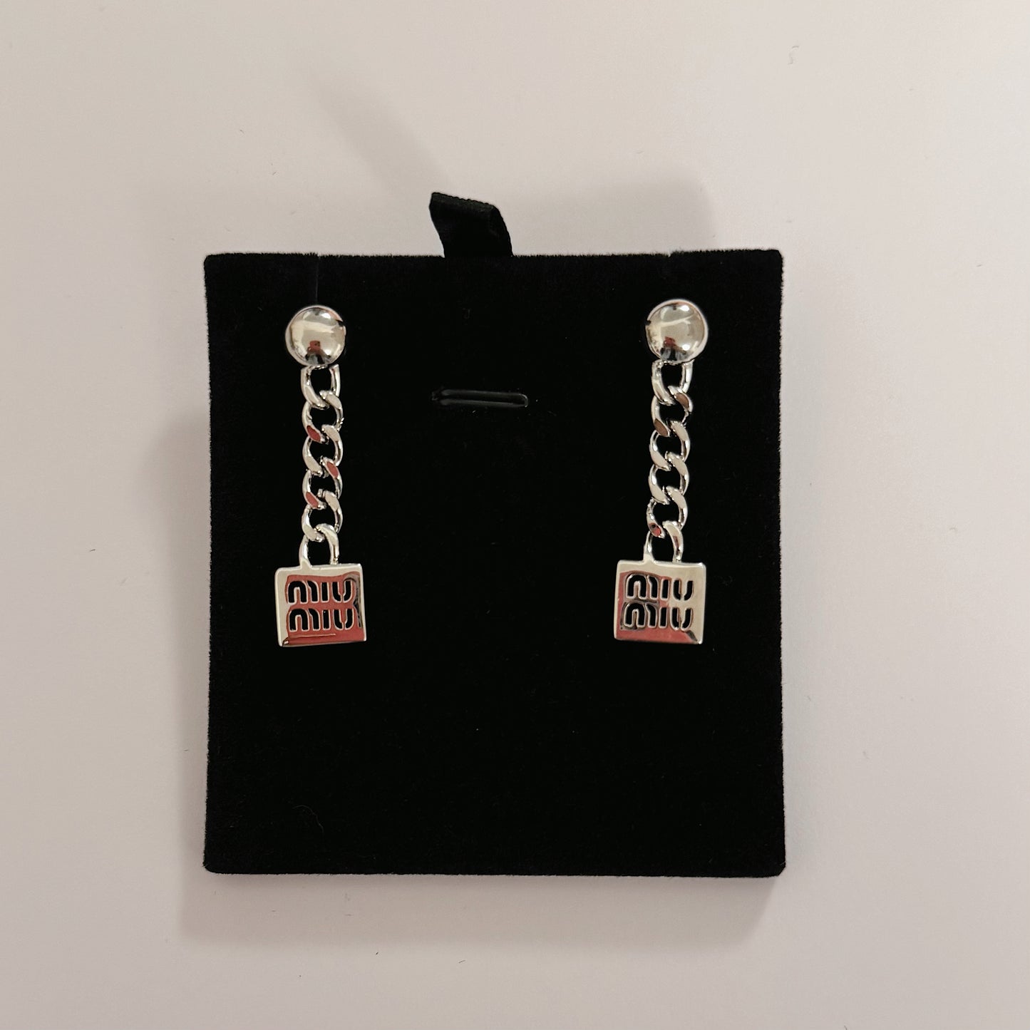MIU silver earring