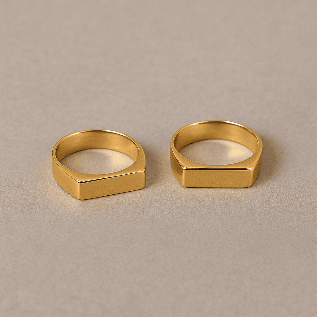 Two minimalist gold square band rings on a soft beige background β MARO Jewelry.