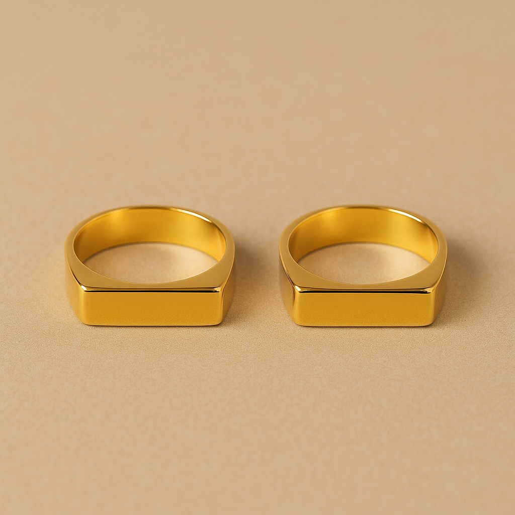 Close-up of two gold square band rings highlighting their shine and elegant design β MARO Jewelry.