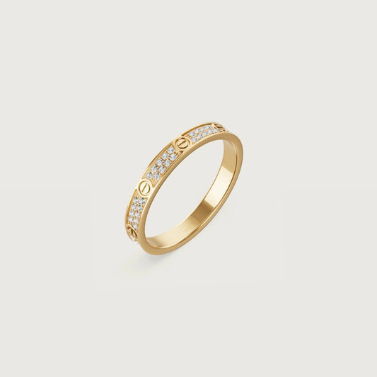 Love Collection thin gold ring with diamond accents and screw motif — MARO Jewelry.