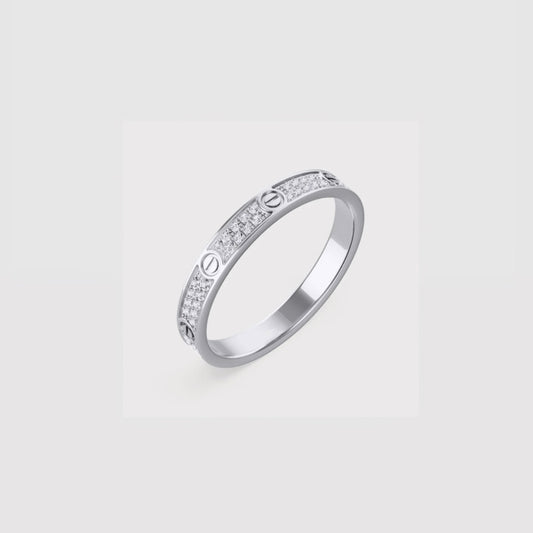 Love Collection thin silver ring with diamond accents and screw motif — MARO Jewelry.