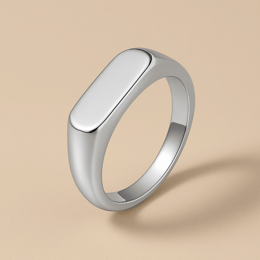 Elegant silver geometric band ring placed on a beige velvet background, highlighting its shine and modern minimalist design β MARO Jewelry.