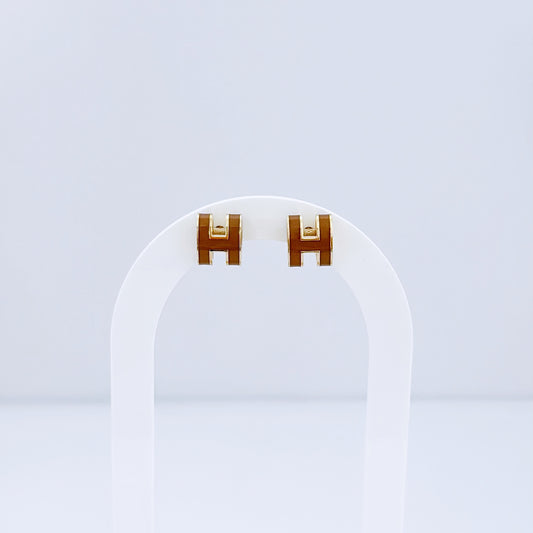 H Brown earring
