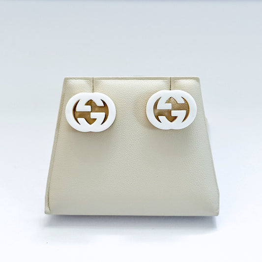 G white earring