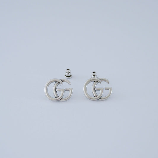 G silver earring