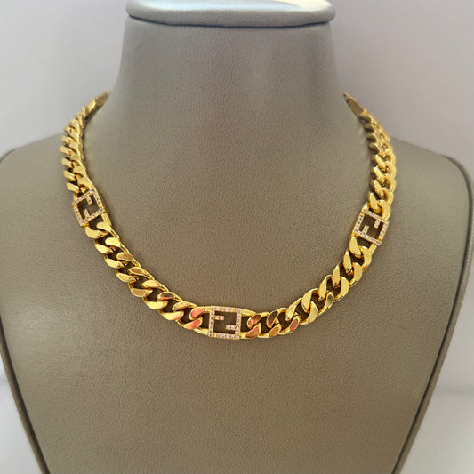 F gold necklace