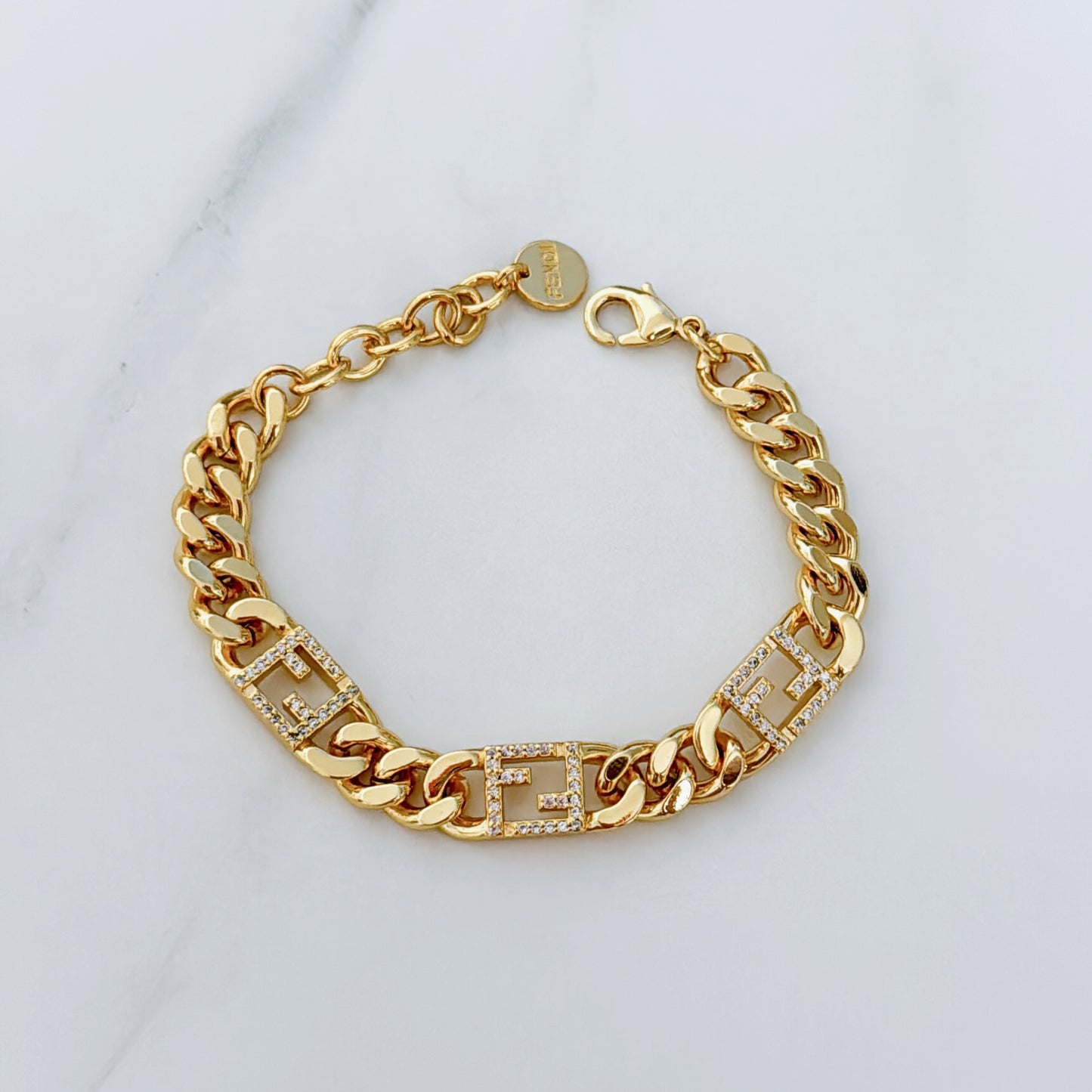 F GOLD BRACELET
