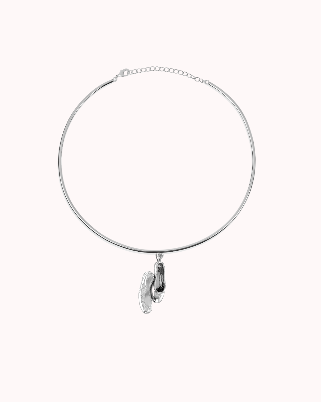 Hard Golden Choker minimalist gold necklace with sculptural pendant, elegant rigid design for modern jewelry style.