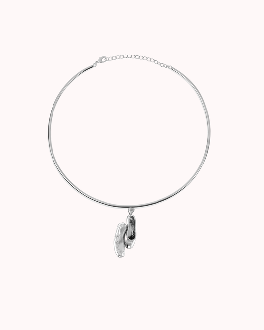 Hard Golden Choker minimalist gold necklace with sculptural pendant, elegant rigid design for modern jewelry style.