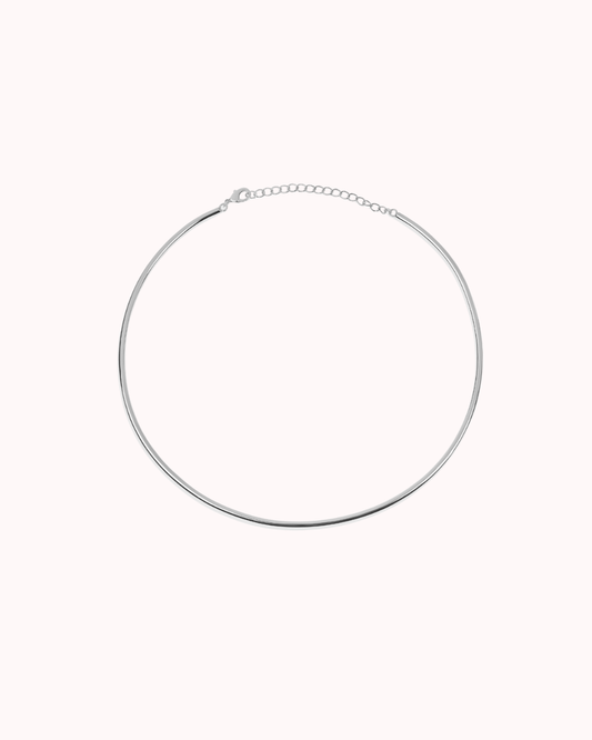 Hard Golden Choker minimalist rigid gold necklace with sleek design, elegant statement jewelry piece.